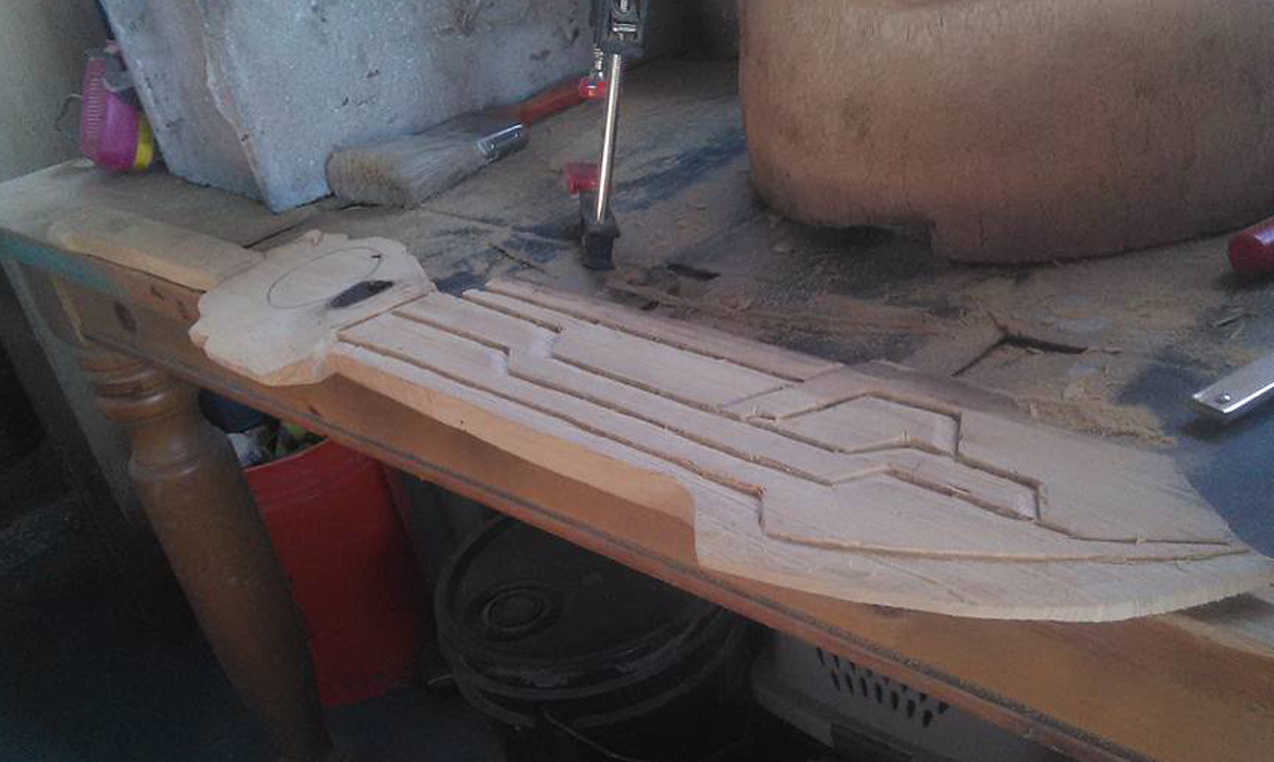 Sword of Justice, Optimus Prime's Weapon. Carved
                from !50 year old Cypress, pulled from an attic in
                Florida